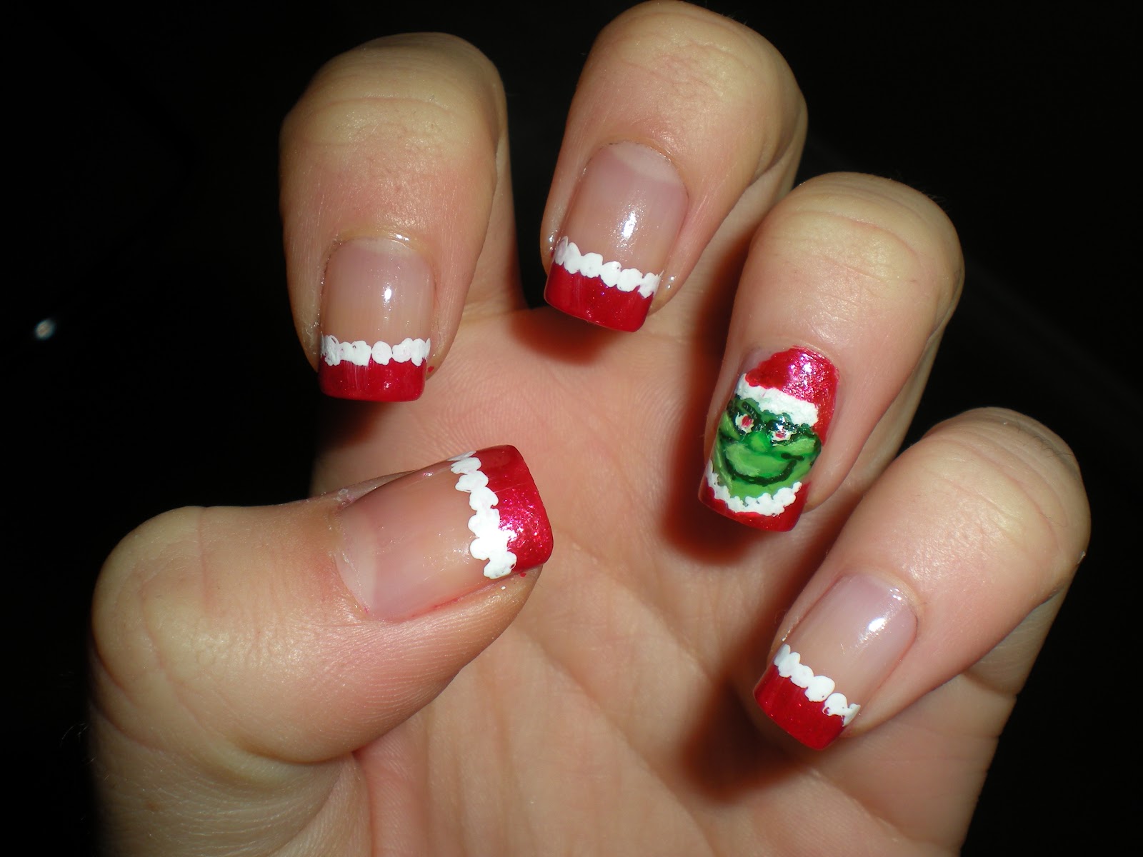 3. Festive "The Grinch" Nail Designs for the Holidays - wide 8