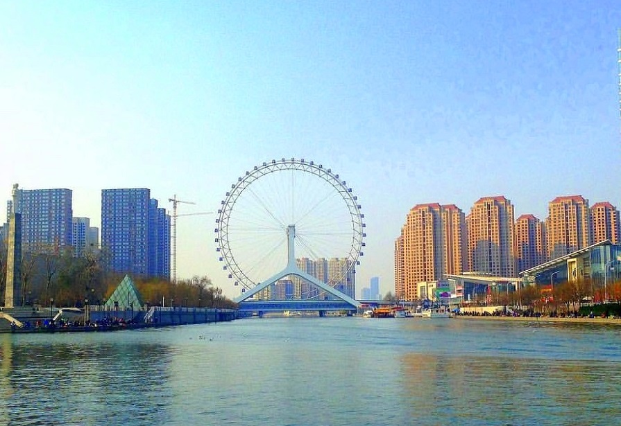 The Tianjin Eye, China -  The only Ferris wheel in the world that is built over a bridge