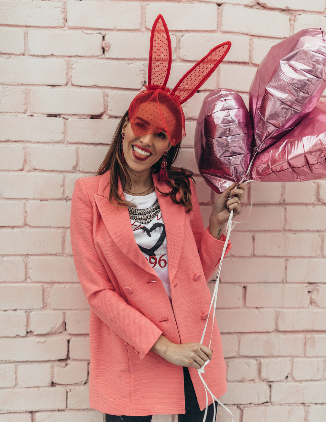 chic valentines day outfit pink blazer tshirt bunny ears lace veil balloons