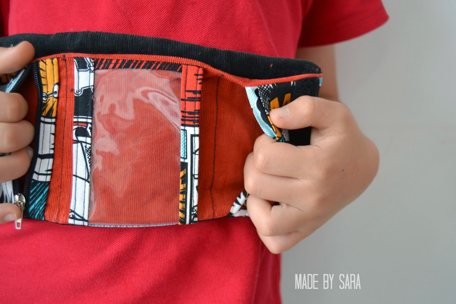 http://made-by-sara.blogspot.com/2014/09/a-wallet-for-little-mr.html