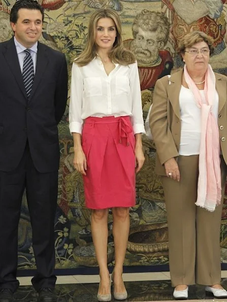 Crown Princess Letizia of Spain attend audiences at Zarzuela Palace in Madrid. wore Hugo Boss dress