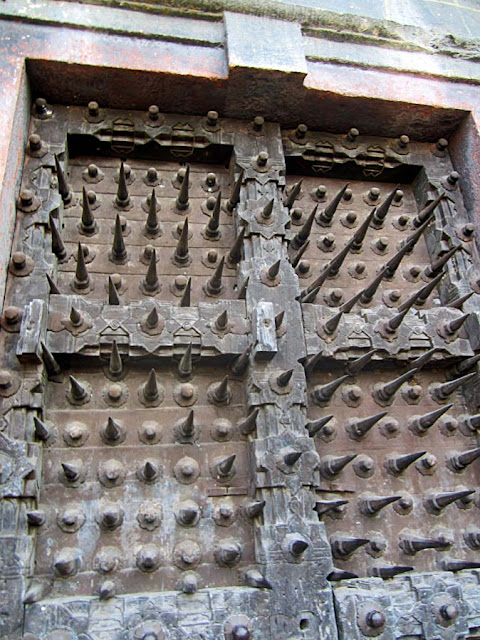iron spikes of ancient door