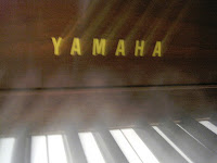 Yamaha logo digital piano