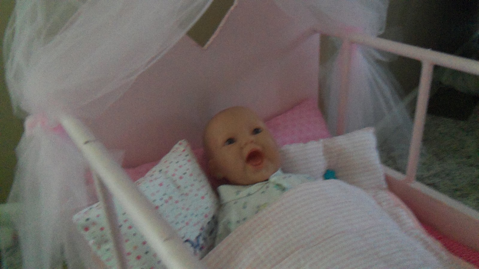 The Toney 5 baby doll bed and bedding.