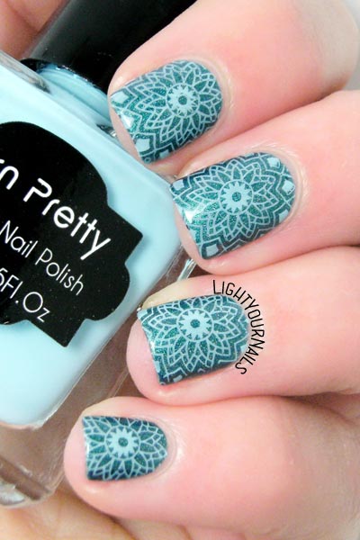 Turquoise kaleidoscope nail art
