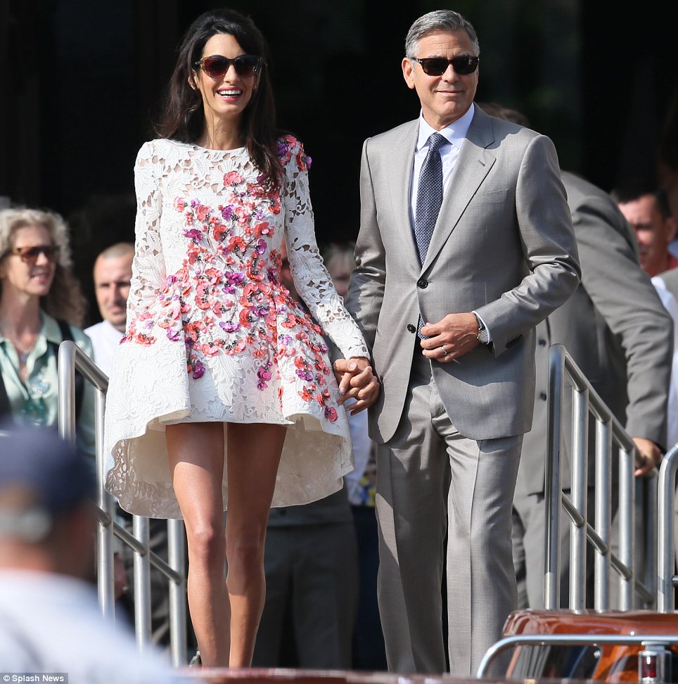 Amal Alamuddin makes first appearance as George Clooney's wife in Venice in a Giambattista Valli dress