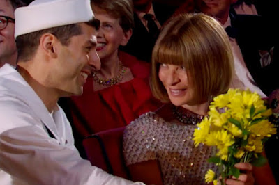 Tony Yazbeck (TONY Award Nominee for Leading Actor in a Musical) presents flowers to Anna Wintour of American Vogue