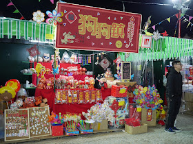 stall selling dog-themed items at Tap Seac Square Lunar New Year Market