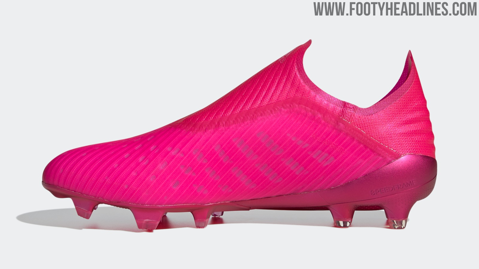 pink and white adidas football boots