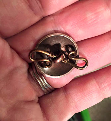 S clasp with button. S clasp with button.