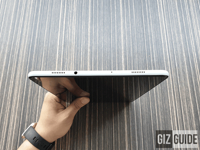 Speakers, 3.5 mm headphone slot, and microphone Speakers, 3.5 mm headphone slot, and microphone