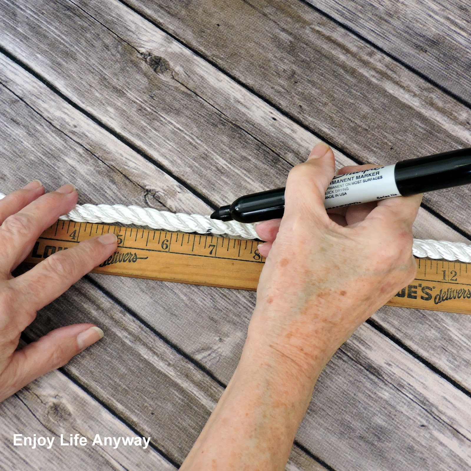 Enjoy Life Anyway DIY Painted Styrofoam Buoy Wreath