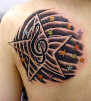 tatuaje estrella con clave de sol
