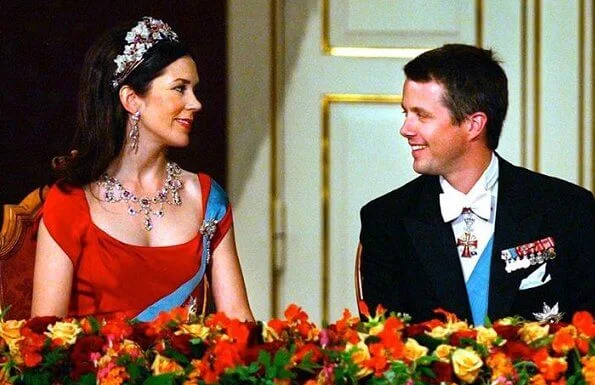 Crown Princess Mary wore Stella McCartney floral denim espadrilles. Crown Prince Frederik support theater