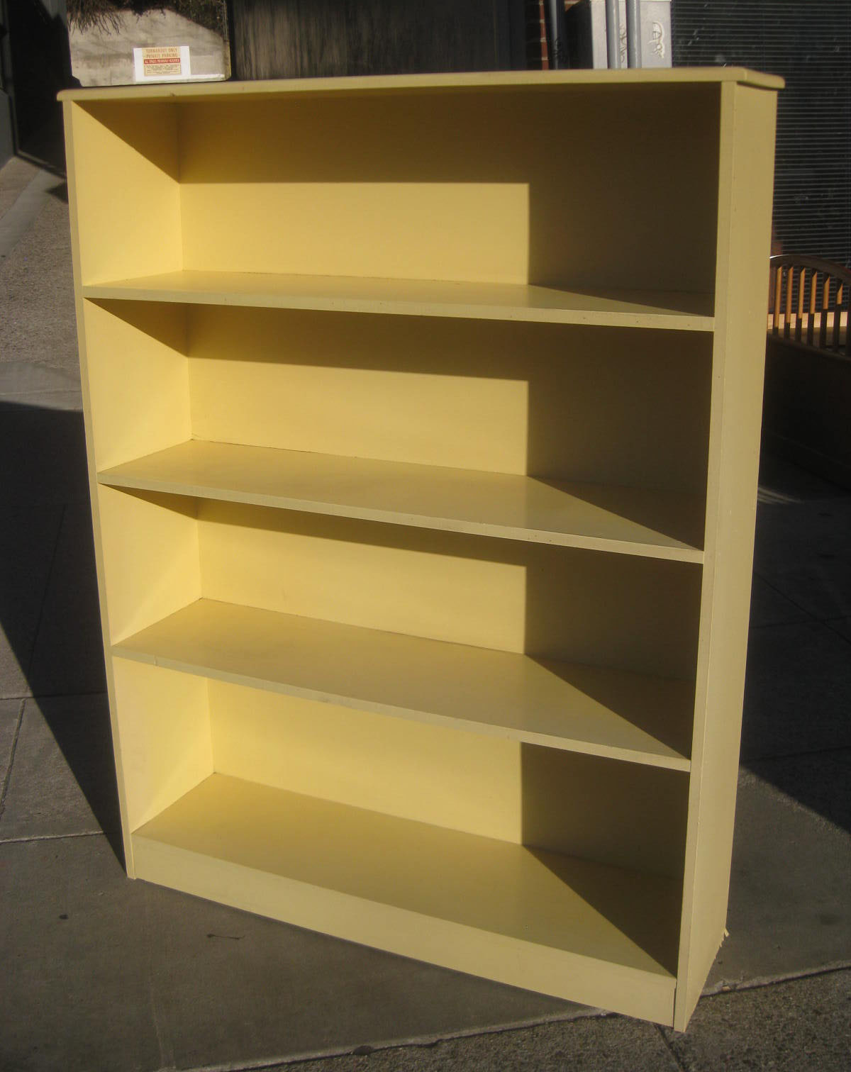 UHURU FURNITURE & COLLECTIBLES SOLD Yellow Bookcase (4' tall) 50