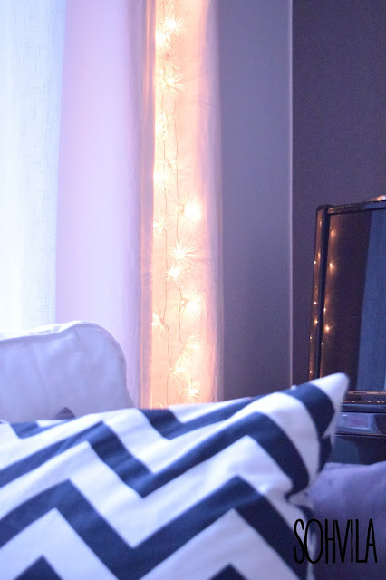 Kukkavalosarja verhoissa Olohuoneen valosarja