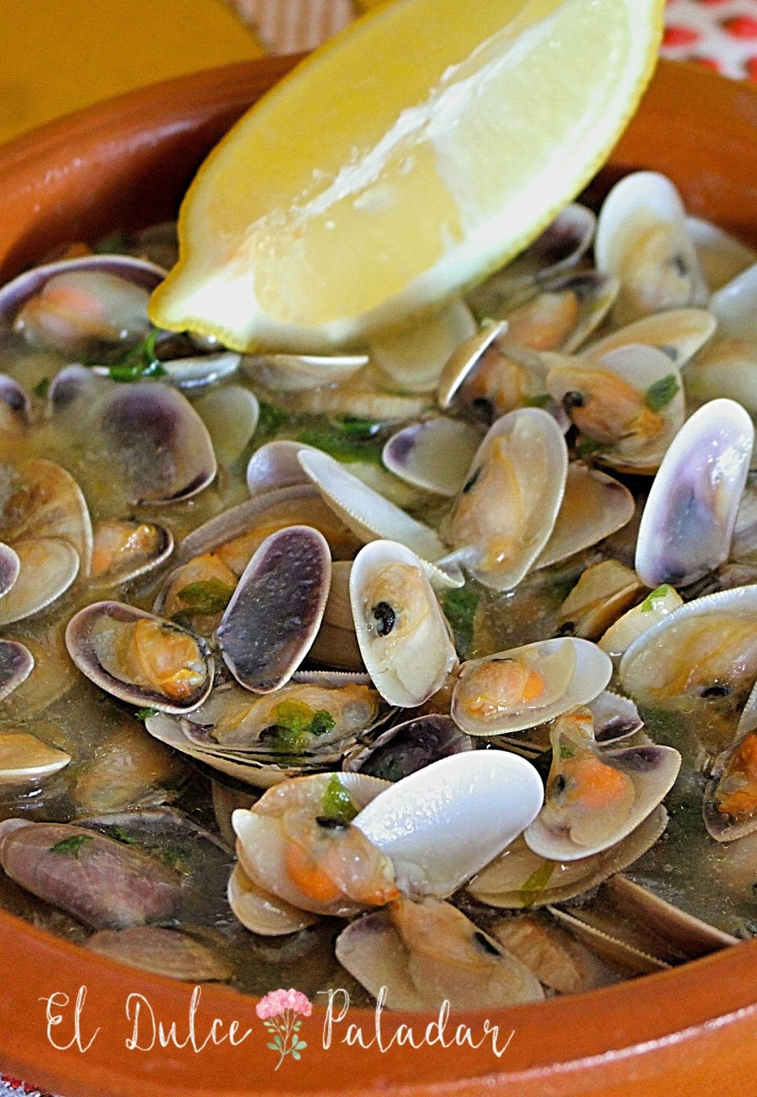 Coquinas de Huelva al ajillo El dulce paladar