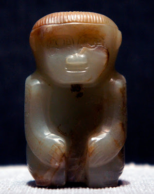 A Shang Dynasty jade statue seated in the “Vajrasana” posture