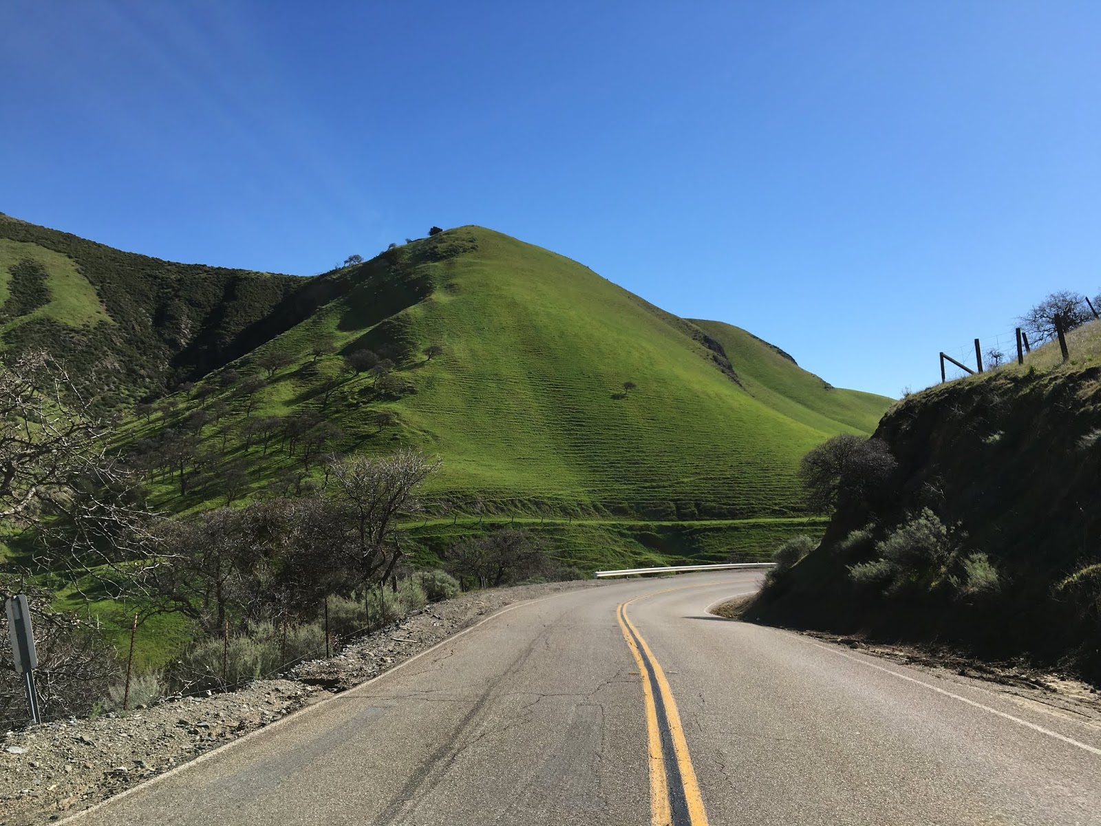 Signed County J2 over Corral Hollow Pass; ghost towns, ghost rails and The Old Road (El Camino
