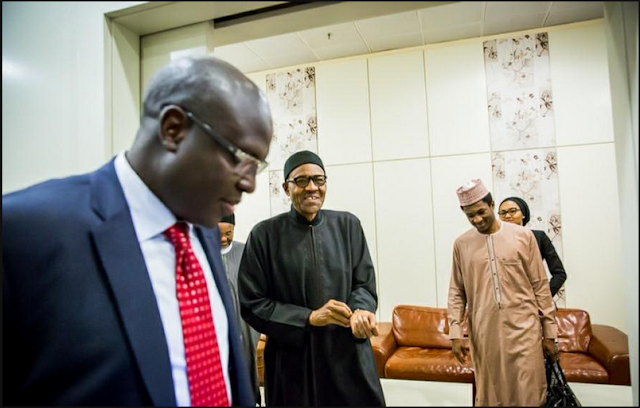 Buhari and his children at Abuja airport