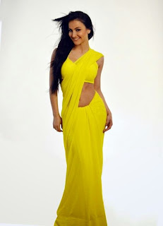 Hot Elli Avram photo in a yellow saree