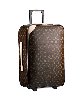 Disappear Here: Luxury Wheeled carry on Luggage selection, Prada, Gucci, LV, Valexta & Loro Piana.