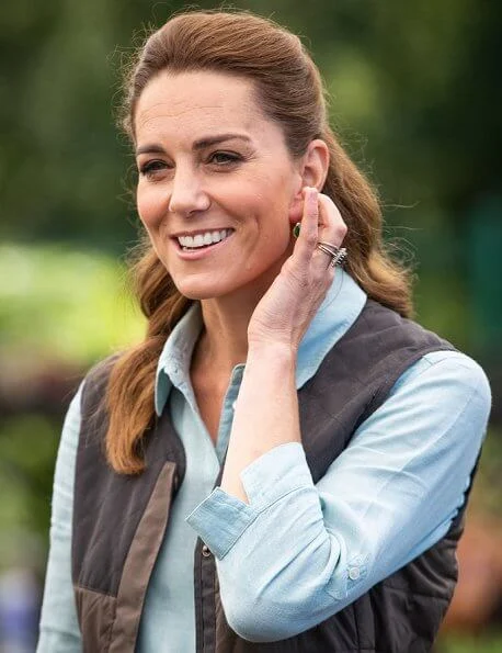 Kate Middleton wore Fjallraven Sormland vest, Jaeger linen shirt, Massimo Dutti satin trousers, Superga sneaker, Monica Vinader earrings