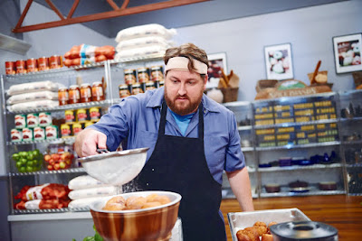 Jay Ducote gives the finishing touch to a dish on The Next Food Network Star.