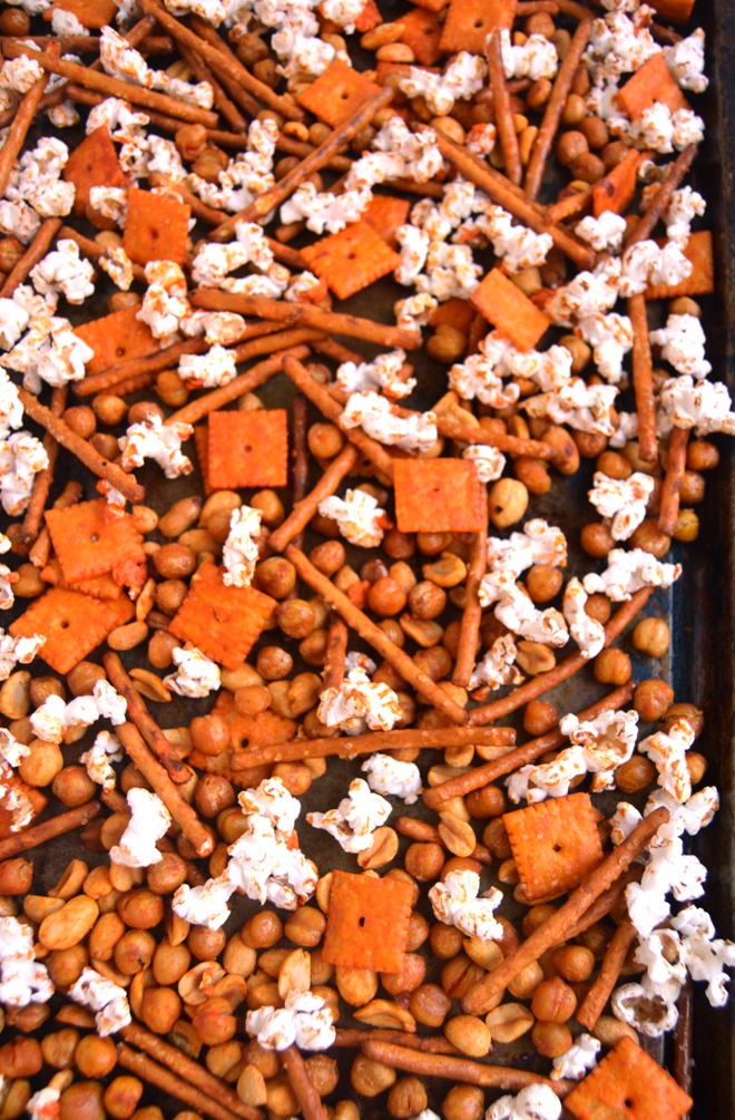 Buffalo Chickpea Snack Mix makes the perfect snack with roasted crunchy chickpeas, Cheez-Its, nuts, pretzels and popcorn and a flavorful buffalo sauce! www.nutritionistreviews.com