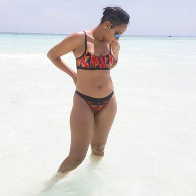 Ex-Big Brother Africa star Pokello shows off her bikini body at the beach.