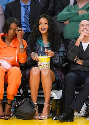 Pop corn loving Rihanna enjoying the match at the Lakers games