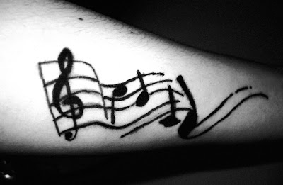 Tattoo Insights: Music Notes Tattoo Designs