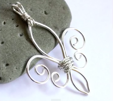 wire wrapped fleur-de-lis pendant