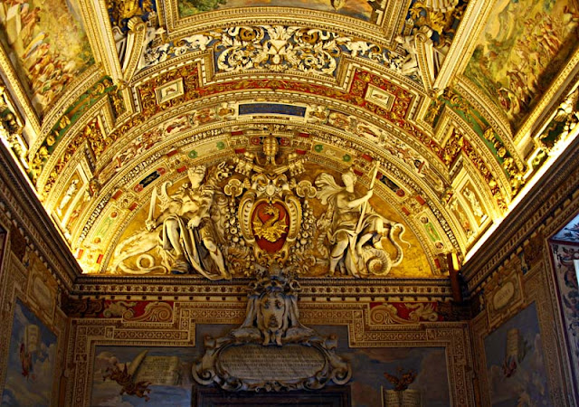  painted architecture at end of corridor at the sistine chapel