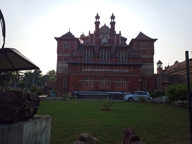 Baroda Museum & Picture Gallery red stone building with garden in Sayaji Baug park, Vadodara