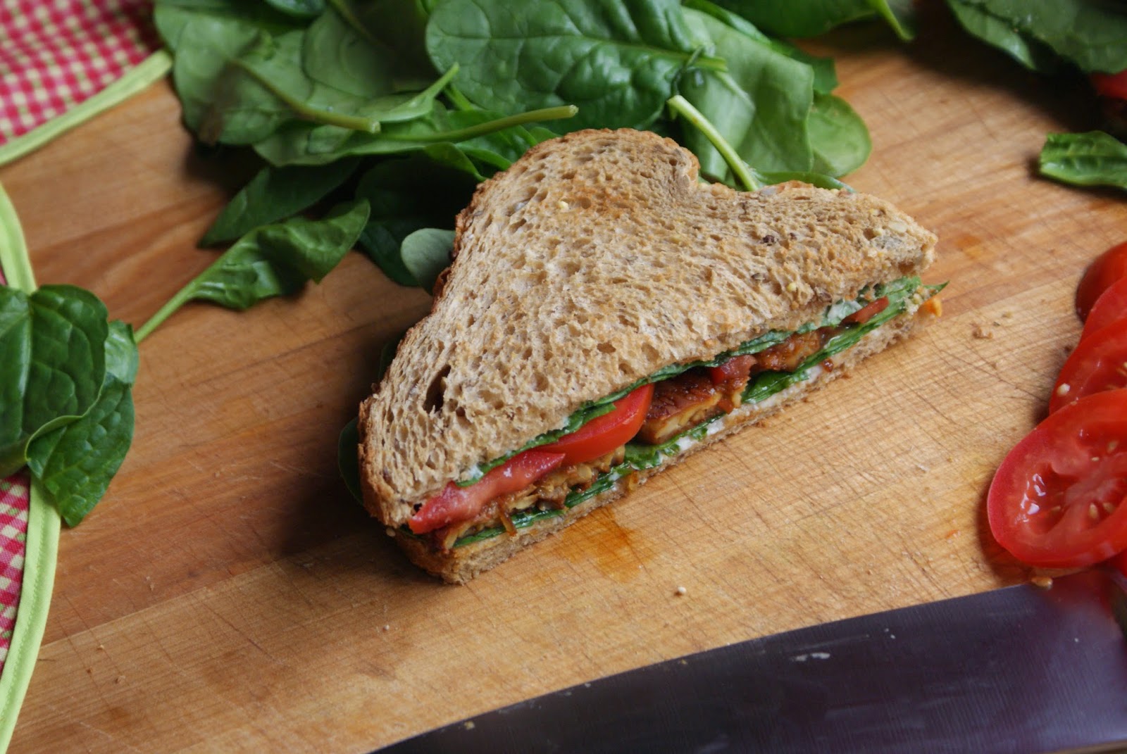 Mostly Plant Based Mama Tempeh, Spinach, and Tomato Sandwich