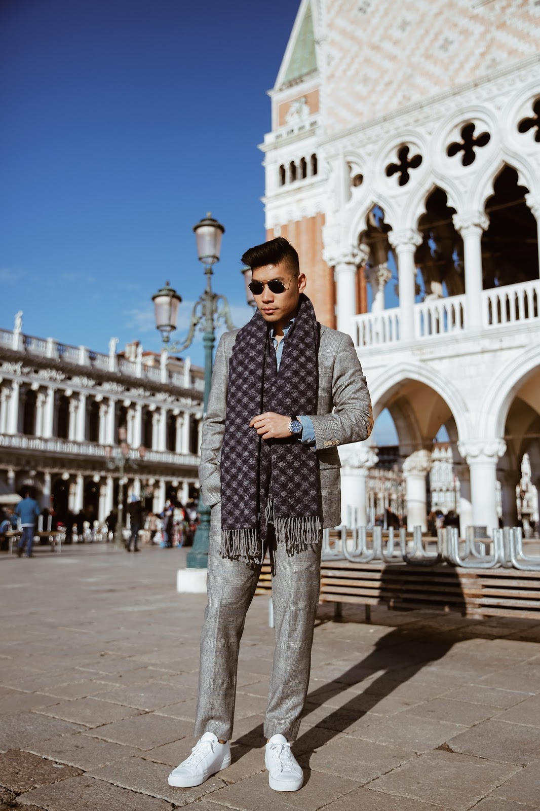 Leo Chan wearing Hart Schaffner Marx Suit on Vacation in Venice, Acne Scarf, Common Project Sneakers | Asian Male Model and Blogger