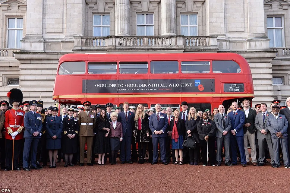 Prince Harry at Buckingham Palace greeting the collectors for London Poppy Day