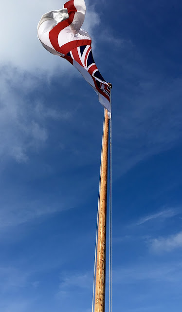 White Ensign flag at Portsmouth Historic Dockyards. UK