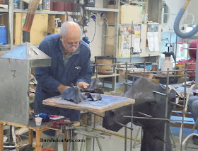Raymondo chases a wax sculpture part in bronze foundry in Pietrasanta, Italy