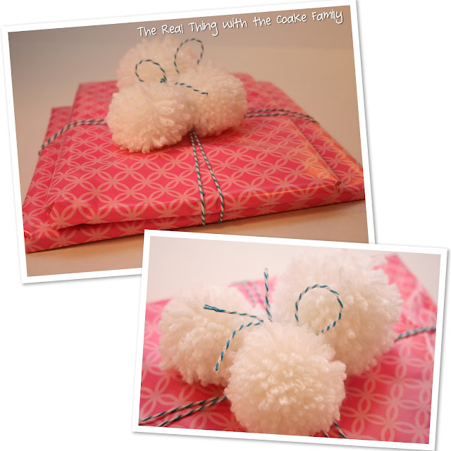 Gift wrap idea using adorable pom poms. #GiftWrap #Gifts #PomPoms #RealCoake