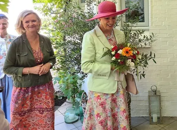 Princess Benedikte attended a lunch with the Danish Consul General in Flensburg. pearls earring and pearl necklace. Crown Princess Mary