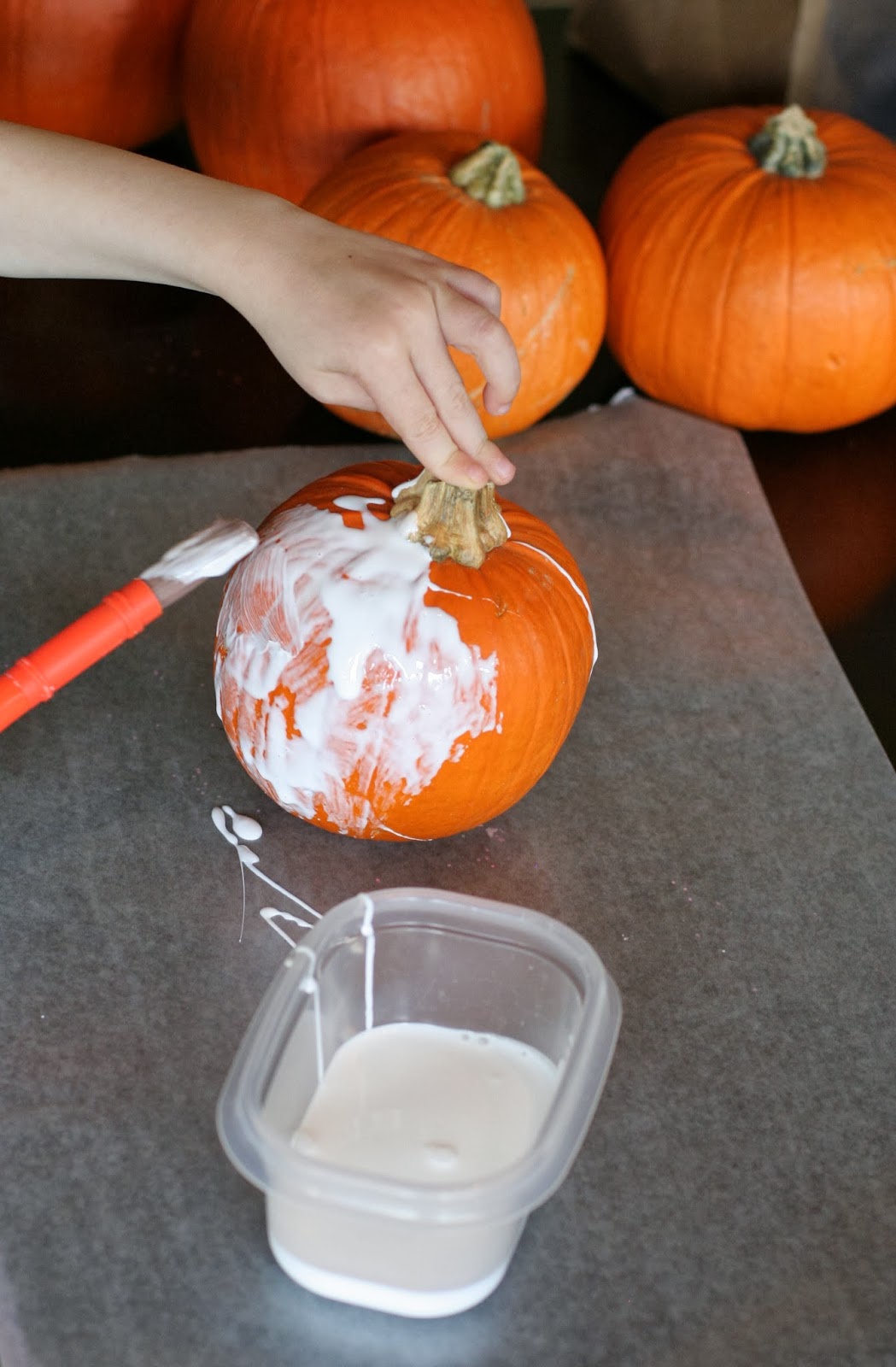 Making Glitter Pumpkins a fun Halloween Craft for Kids