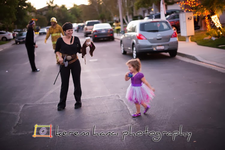 Mommy Pirate walking her Ballerina Witch Daughter