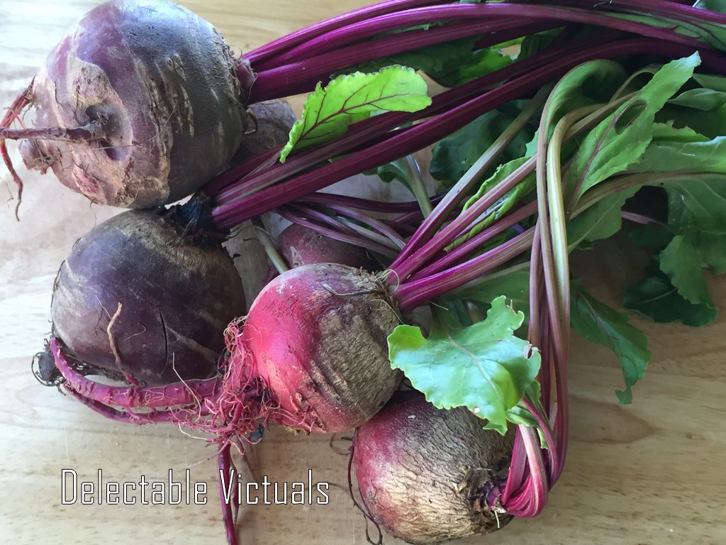 Delectable Victuals Marinated Beets and Greens Salad with Sunflower Seeds