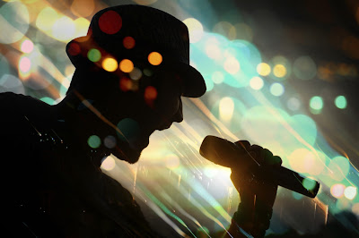 silhouette of a singer on stage 