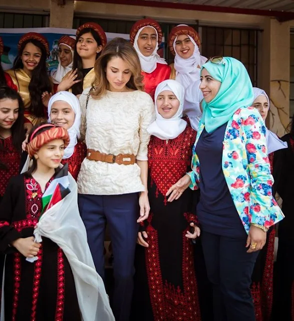 Queen Rania of Jordan visited the Safout Secondary School for Girls in connection with 70th anniversary of Jordan’s Independence Day and the 100th anniversary of the Great Arab Revolt. Queen Rania Style, Fendi dress, a bag