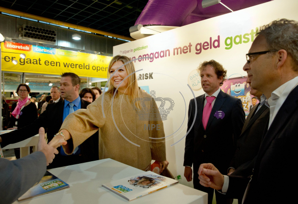Queen Maxima of The Netherlands visits the stand Wijzer in Geldzaken during the national education fair in the Jaarbeurs in Utrecht,