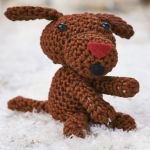 http://www.letsknit.co.uk/free-knitting-patterns/floyd-the-singing-dog