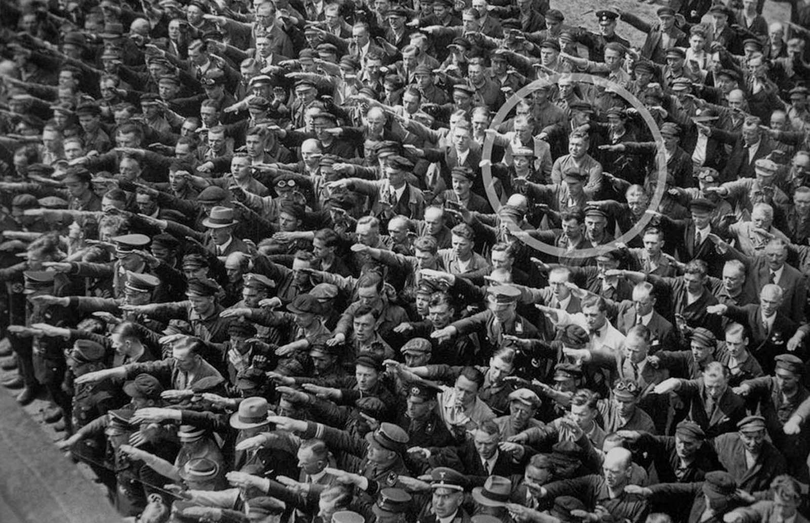 August Landmesser, the man who folded his arms.